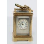 MINIATURE BRASS & PORCELAIN CARRIAGE CLOCK