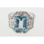 18 CT WHITE GOLD, AQUAMARINE AND DIAMOND RING