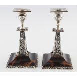 PAIR OF SILVER AND TORTOISEHELL CANDLESTICKS