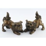 PAIR OF CHINESE QING BRONZE FOO DOGS