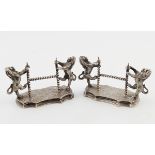 PAIR OF ARMORIAL SILVER KNIFE REST