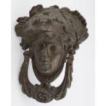 EIGHTEENTH-CENTURY BRASS DOOR KNOCKER