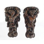 PAIR OF 16/17TH-CENTURY WALNUT WALL BRACKETS