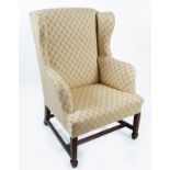 GEORGE III PERIOD MAHOGANY WING BACK ARMCHAIR