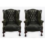 PAIR OF EDWARDIAN HIDE UPHOLSTERED WING BACK ARMCHAIRS