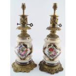 PAIR OF FRENCH ORMOLU AND PORCELAIN LAMPS