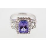 18 CT WHITE GOLD, TANZANITE & DIAMOND CLUSTER RING