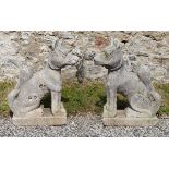 PAIR OF 19TH-CENTURY MOULDED STONE DOGS