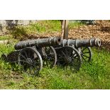 PAIR OF CAST IRON CANONS