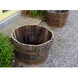 TWO HOOPED WOODEN BARRELS