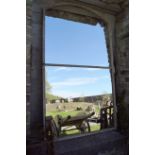 PAIR OF METAL FRAMED ARCHED MIRRORS