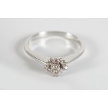 18 CT. WHITE GOLD CLUSTER RING
