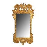 IRISH EIGHTEENTH-CENTURY CARVED GILT WOOD FRAMED PIER MIRROR, CIRCA 1750