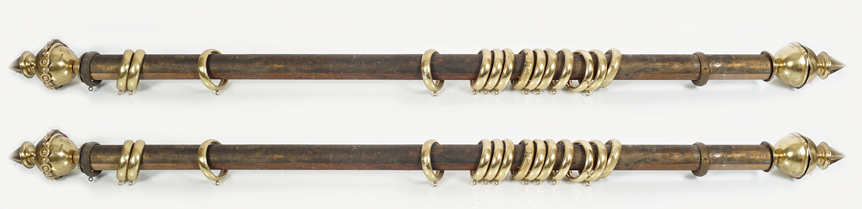 PAIR OF EBONIZED AND BRASS CURTAIN POLES