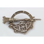 SILVER TARA BROOCH