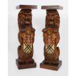 PAIR OF 19TH-CENTURY LION ARMORIAL PLINTHS