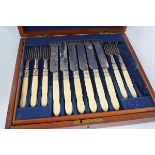 CAST SET OF SIX BONE HANDLED KNIVES AND FORKS