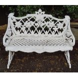 PAIR OF ORNATE CAST IRON GARDEN BENCHES