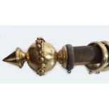 LARGE EBONIZED AND BRASS CURTAIN POLE