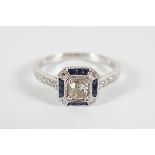 18CT WHITE GOLD SAPPHIRE AND DIAMOND CLUSTER RING