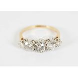 18 CT. GOLD AND DIAMOND 5 STONE RING