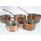 ANTIQUE SET OF FIVE GRADUATED SAUCEPANS