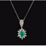 18 CT. WHITE GOLD EMERALD AND DIAMOND PENDANT