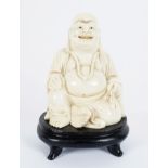 FIGURE OF A SEATED BUDDHA