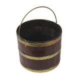 GEORGIAN MAHOGANY AND BRASS BOUND PEAT BUCKET