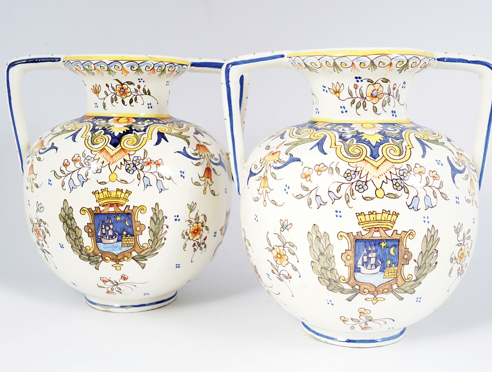PAIR OF FAIENCE TREPORT ARMORIAL VASES