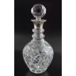 HEAVY CRYSTAL AND SILVER MOUNTED DECANTER