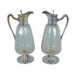 PAIR OF AUSTRIAN GLASS MOUNTED CLARET JUGS