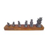 SET OF 6 CHINESE BRONZE GRADUATED SCROLL WEIGHTS