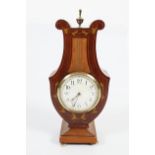 EDWARDIAN MAHOGANY AND SATINWOOD MANTLE CLOCK