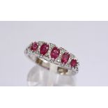 18CT WHITE GOLD RUBY AND DIAMOND RING