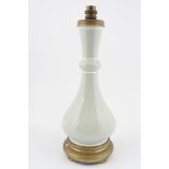 CELADON GLAZED AND BRASS VASE STEMMED TABLE LAMP