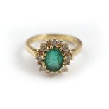 18CT GOLD EMERALD AND DIAMOND CLUSTER RING