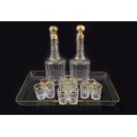 PAIR OF CRYSTAL AND PARCEL GILT DECANTERS