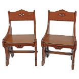 PAIR OF AESTHETIC REVIVAL OAK HALL SEATS