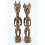 PAIR OF EARLY AFRICAN CARVED CEREMONIAL FIGURES