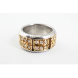 18 CT. GOLD AND STEEL PUZZLE RING