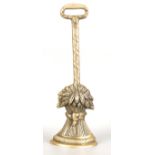 19TH-CENTURY BRASS DOOR STOP