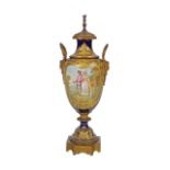 19TH-CENTURY SEVRES PORCELAIN & ORMOLU URN