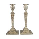 PAIR OF NEO-CLASSICAL SILVER CANDLESTICKS