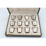 SET OF 12 STERLING SILVER STIRRUP CUPS