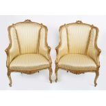 PAIR OF CARVED GILTWOOD WINGBACK ARMCHAIRS