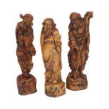 GROUP OF THREE CHINESE CARVED FIGURES