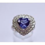 18CT WHITE GOLD TANZANITE AND DIAMOND RING