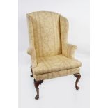 MAHOGANY AND UPHOLSTERED WING BACK ARMCHAIR