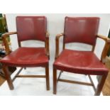 Pair 20thC mahogany rexine covered office arm chairs